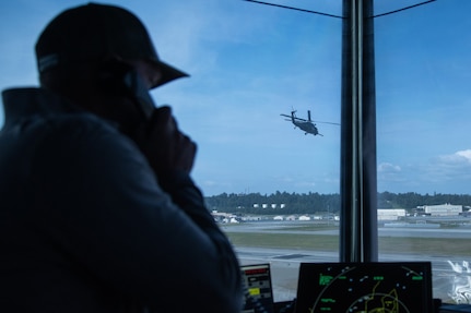 An Alaska National Guard 210th Rescue Squadron HH-60W Jolly Green II carrying 212th Rescue Squadron pararescuemen returns to Joint Base Elmendorf-Richardson after an Aug. 9, 2026, mission rescuing a pilot of a Cessna 185 that crashed near Trapper Joe Lake about 25 miles south of Anchorage.