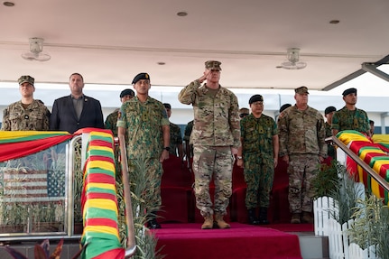 U.S. Army Col. Michael Scanlon, deputy chief of staff for operations, Oklahoma Army National Guard salutes the formation during the opening ceremony for Exercise Pahlawan Warrior 26 at Tutong Camp near Bandar Seri Begawan, Brunei, Aug. 11, 2026.