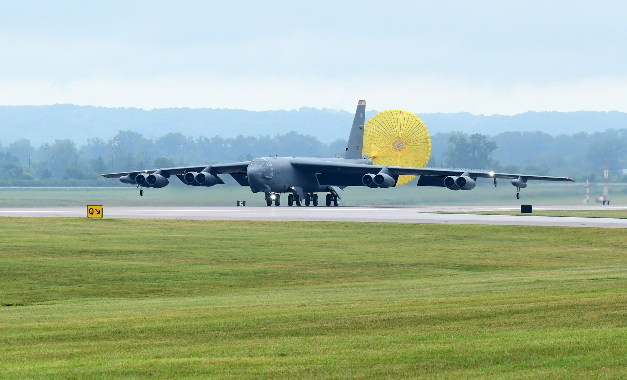 A B-52 Stratofortress aircraft lands at Offutt Air Force Base, Nebraska for the Defenders of Freedom Air & Space Show 2026, Aug. 5, 2026. The event highlighted the historic evolution of military aviation, bridging the gap between legacy heritage platforms and modern combat capabilities to preserve and share military history. (U.S. Air Force photo by Charles J. Haymond)