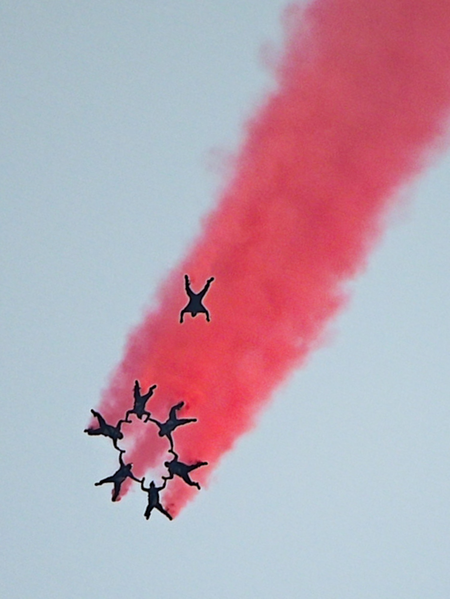 U.S. Air Force Academy Wings of Blue parachuting team performs canopy maneuvers during the 2026 Defenders of Freedom Air & Space Show at Offutt Air Force Base, Nebraska, Aug. 9, 2026. The open house provided a rare opportunity for loca Greater Omaha residents to interact directly with service members, ask questions, and explore the military aircraft that make the nation's global defense possible. (U.S. Air Force Photo by Airman 1st Class Charles Bolden)