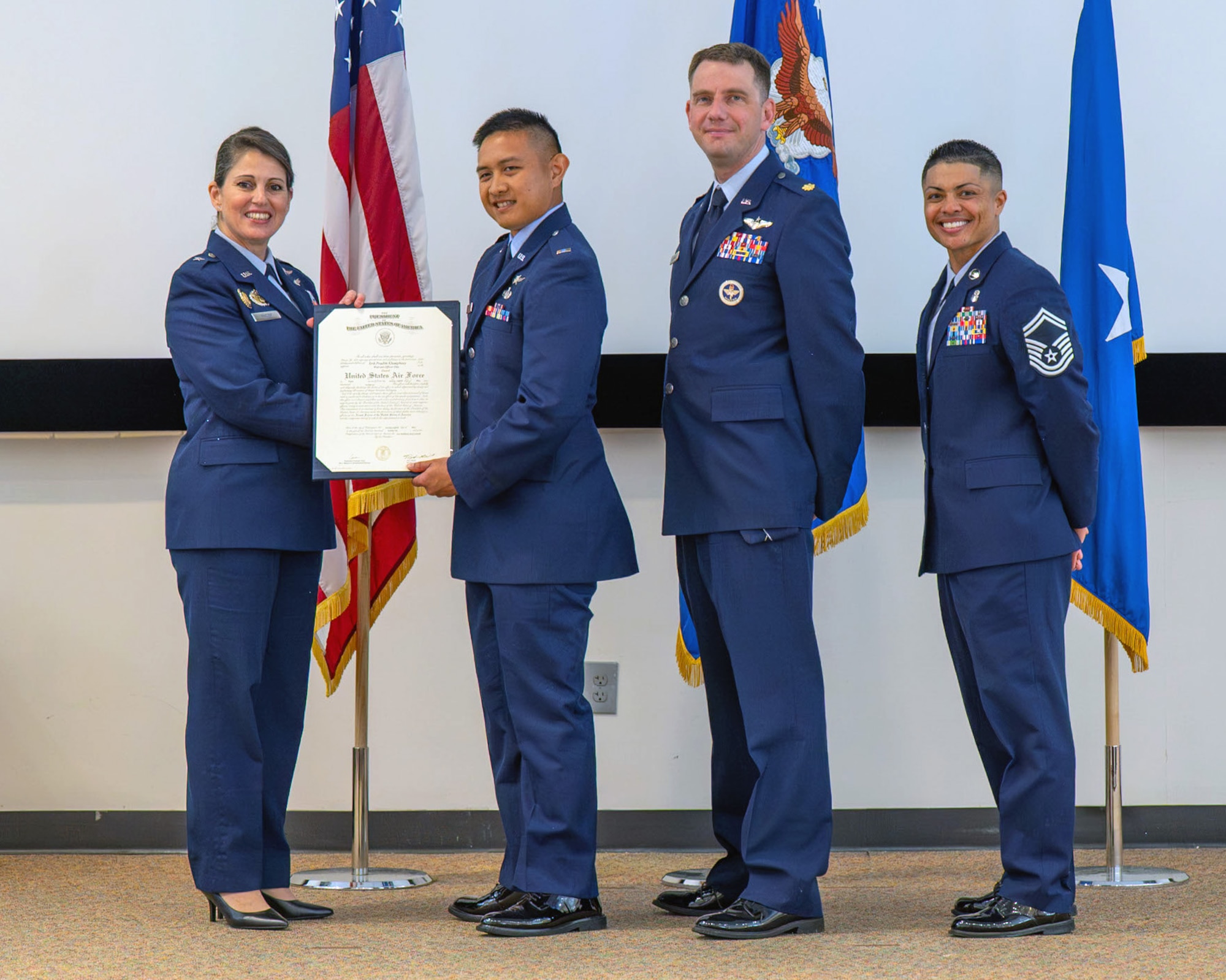 Airman in graduation ceremony.