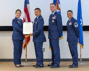 Airman in graduation ceremony.