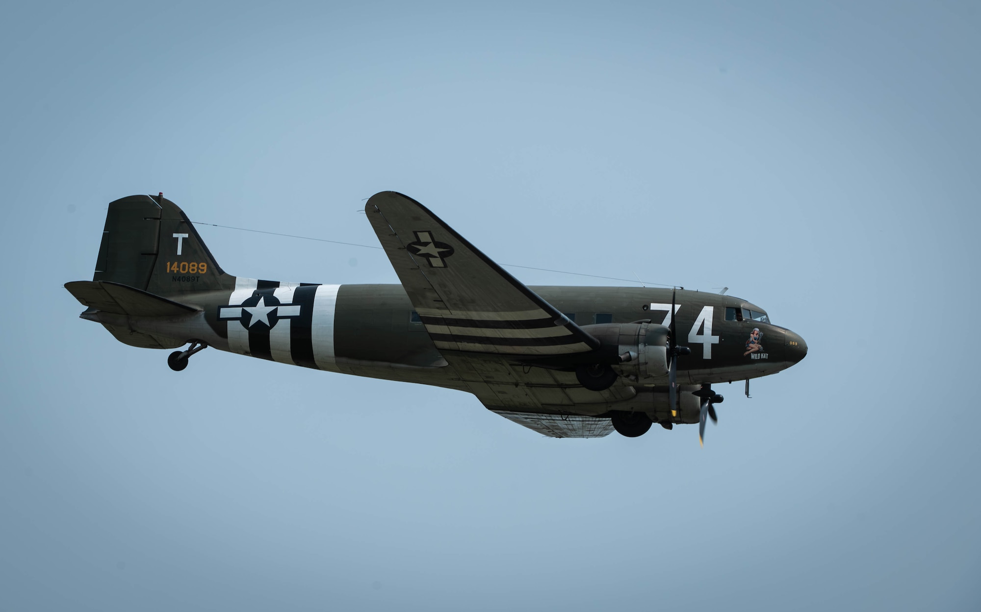 A C-47 Skytrain performs a flyover during the 2026 Defenders of Freedom Air & Space Show at Offutt Air Force Base, Nebraska, Aug. 9, 2026. In alignment with the nationwide 'Freedom 250' celebration, the air show highlighted two and a half centuries of American progress, liberty, and the technological leaps made throughout military aviation history. (U.S. Air Force photo by Daniel Martinez)