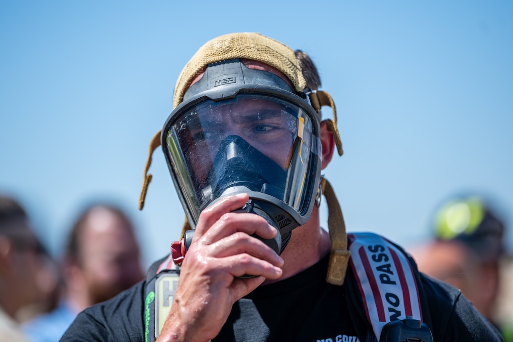 First responder removes protective mask.