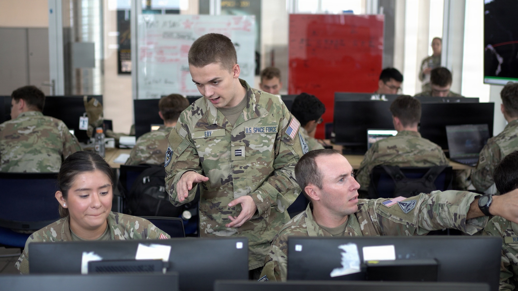 Cadets interacting in uniform at Azimuth program