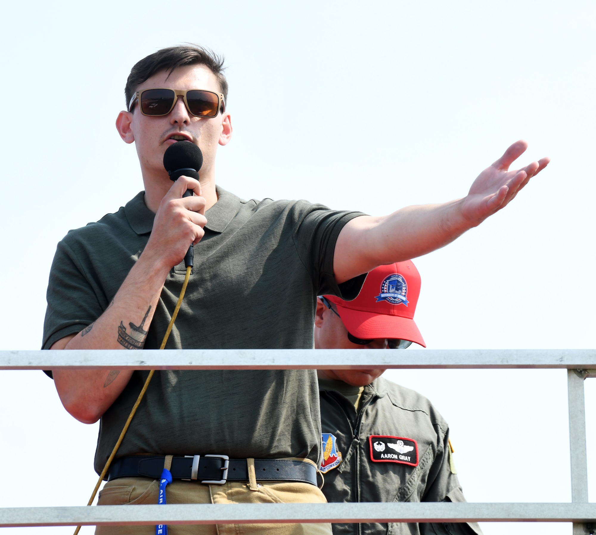 Airman 1st Class Charles Bolden, 55th Wing public affairs specialist, speaks to the audience as “Air Show Alan” during the 2026 Defenders of Freedom Air and Space Show Aug. 8, at Offutt Air Force Base, Nebraska. The event served as a platform to celebrate Offutt's military heritage, honoring the unique civilian-military bond with the Greater Omaha community that has supported the nation's defense for generations. (U.S. Air Force photo by Charles J. Haymond)