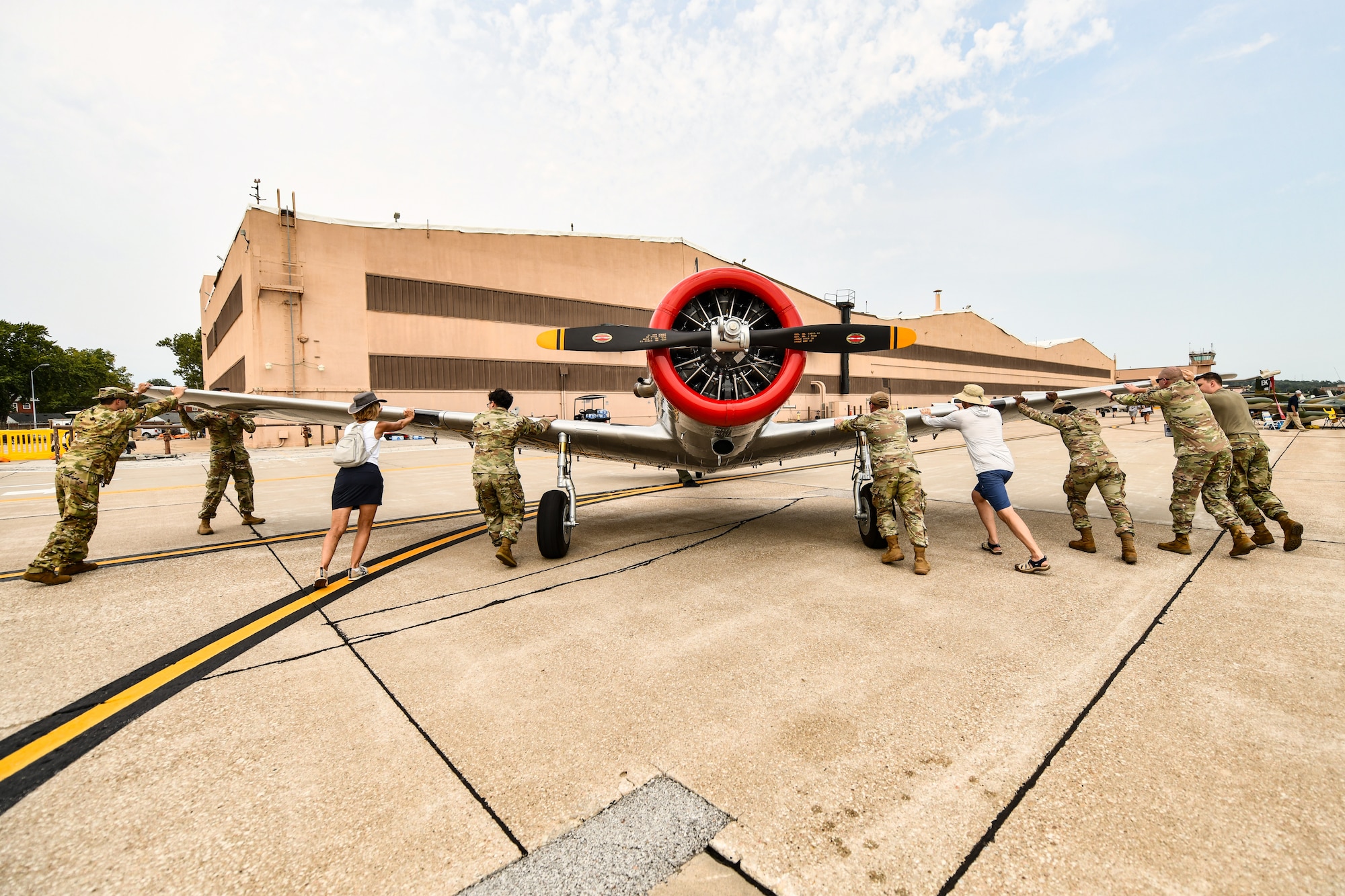 An audience tours a TBM Avenger during the Defenders of Freedom Air & Space Show 2026 at Offutt Air Force Base, Nebraska, Aug. 9, 2026. The event served as a platform to celebrate Offutt's military heritage, honoring the unique civilian-military bond with the Greater-Omaha community that has supported the nation's defense for generations.