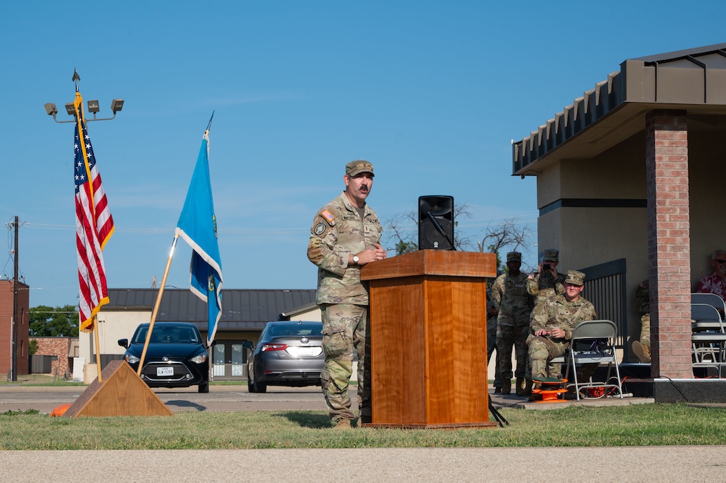 U.S. Army Chief Warrant Officer 2 Remington Whiteside, outgoing Bravo Company, 344th Military Intelligence Battalion commander, speaks during a change of command ceremony at Goodfellow Air Force Base, Texas, Aug. 7, 2026.