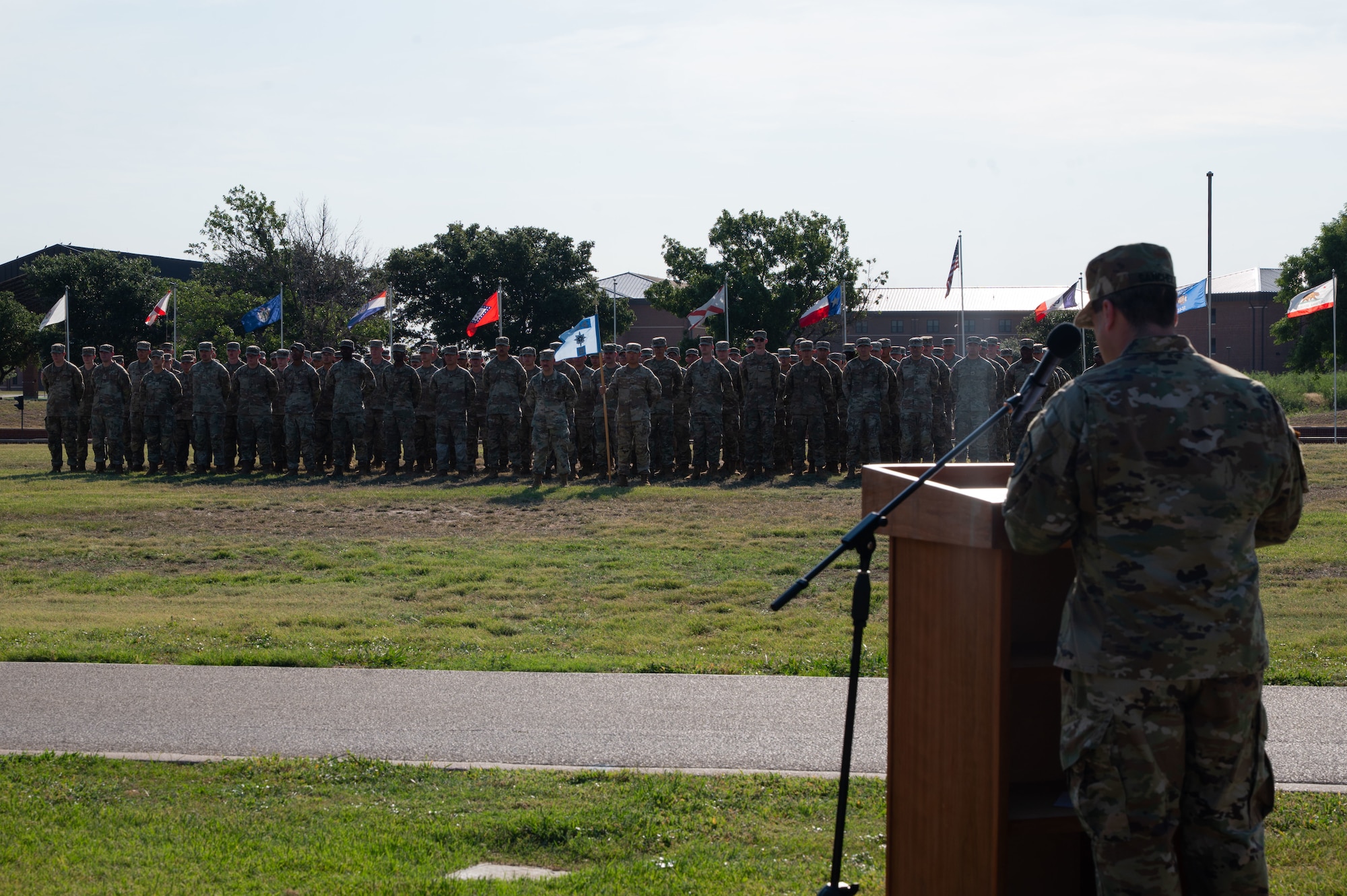 U.S. Army Capt. Andres Sanchez, incoming Bravo Company, 344th Military Intelligence Battalion commander, speaks during a change of command ceremony at the Parade Field, Goodfellow Air Force Base, Texas, Aug. 7, 2026.