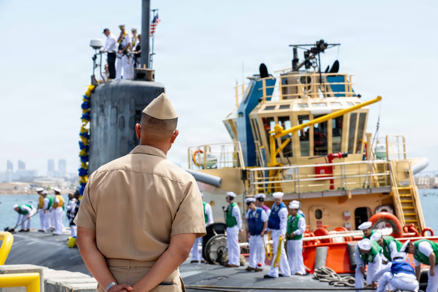 NAVAL BASE POINT LOMA, Calif. (July 21, 2026) Capt. Phillip Sylvia Jr., commander, Submarine Squadron (CSS-11), observes from the pier as Los Angeles-class fast-attack submarine USS Springfield (SSN 761) arrives to its new homeport at Naval Base Point Loma, July 21, 2026. Springfield is assigned to CSS-11, home to four Los Angeles-class fast-attack submarines which are capable of supporting various missions, including anti-submarine warfare, anti-ship warfare, strike warfare and intelligence, surveillance and reconnaissance. (U.S. Navy photo by Mass Communication Specialist 2nd Class Rashan Jefferson)