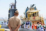 NAVAL BASE POINT LOMA, Calif. (July 21, 2026) Capt. Phillip Sylvia Jr., commander, Submarine Squadron (CSS-11), observes from the pier as Los Angeles-class fast-attack submarine USS Springfield (SSN 761) arrives to its new homeport at Naval Base Point Loma, July 21, 2026. Springfield is assigned to CSS-11, home to four Los Angeles-class fast-attack submarines which are capable of supporting various missions, including anti-submarine warfare, anti-ship warfare, strike warfare and intelligence, surveillance and reconnaissance. (U.S. Navy photo by Mass Communication Specialist 2nd Class Rashan Jefferson)