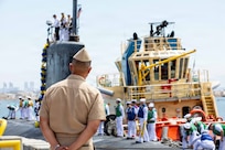 NAVAL BASE POINT LOMA, Calif. (July 21, 2026) Capt. Phillip Sylvia Jr., commander, Submarine Squadron (CSS-11), observes from the pier as Los Angeles-class fast-attack submarine USS Springfield (SSN 761) arrives to its new homeport at Naval Base Point Loma, July 21, 2026. Springfield is assigned to CSS-11, home to four Los Angeles-class fast-attack submarines which are capable of supporting various missions, including anti-submarine warfare, anti-ship warfare, strike warfare and intelligence, surveillance and reconnaissance. (U.S. Navy photo by Mass Communication Specialist 2nd Class Rashan Jefferson)
