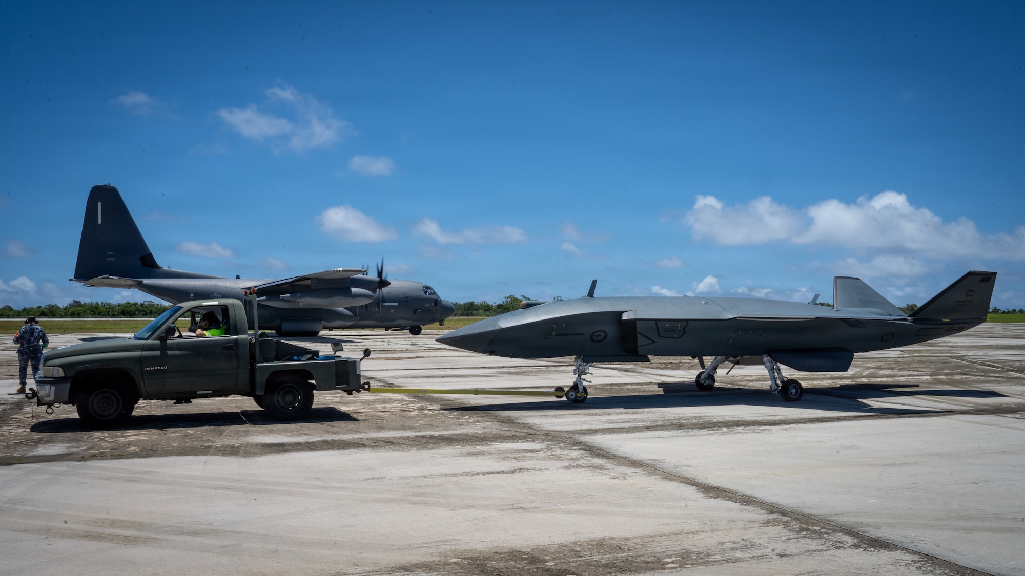 A Boeing Defence Australia’s MQ-28 Ghost Bat, a production representative test aircraft, is towed to a simulated forward area refueling point during Exercise Valiant Shield 2026 on Rota, Commonwealth of the Northern Mariana Islands, June 28, 2026. FARP allows combat aircraft and helicopters to rapidly refuel and rearm closer to the frontline, drastically reducing turnaround times and extending their operational range. (U.S. Air Force photo by Senior Airman Adrien Tran)