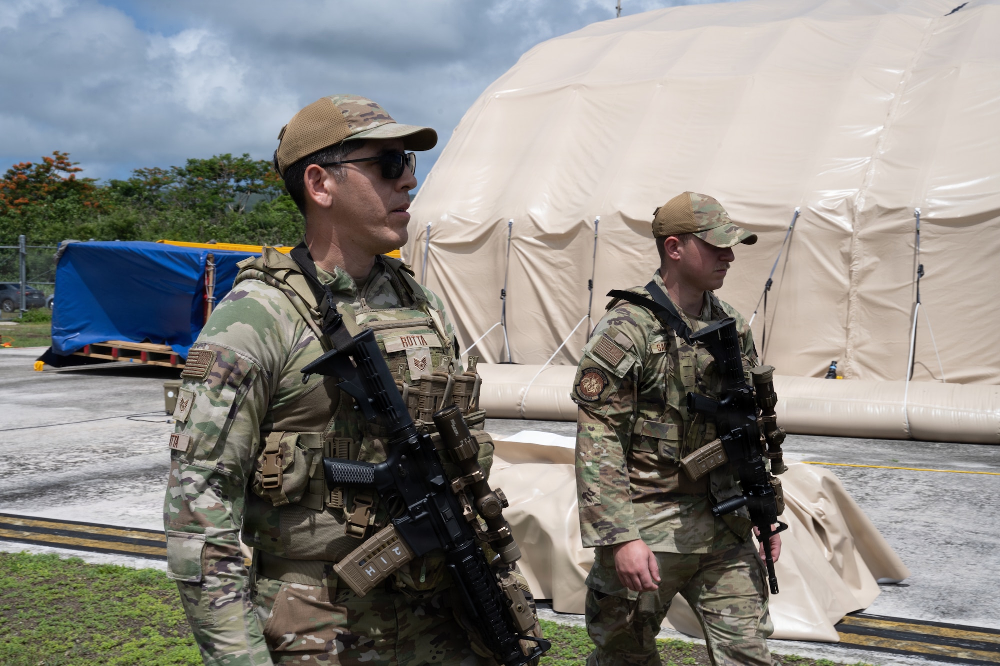 U.S. Air Force Staff Sgt. Bruno Rotta, 21st Combat Air Base Squadron security forces base defense operations controller, left, and Senior Airman Preston Saunders, 21st CABS security forces response force member, right, conducts patrols during Exercise Valiant Shield 2026 on Rota, Commonwealth of the Northern Mariana Islands, June 29, 2026. The 21st CABS rapidly deploys and operates from austere airfields to project combat power anytime, anywhere in support of a free and open Indo-Pacific. (U.S. Air Force photo by Senior Airman Adrien Tran)