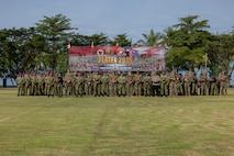 U.S. Marines with Alpha Company, 1st Battalion, 5th Marine Regiment, Marine Rotational Force – Darwin 26, and Indonesian marines with 7th Infantry Battalion, 4th Infantry Brigade, pose for a photo during an opening ceremony as part of a platoon exchange at the Indonesian Marine Corps 7th Battalion base near Lampung, Indonesia, Aug. 12, 2026.