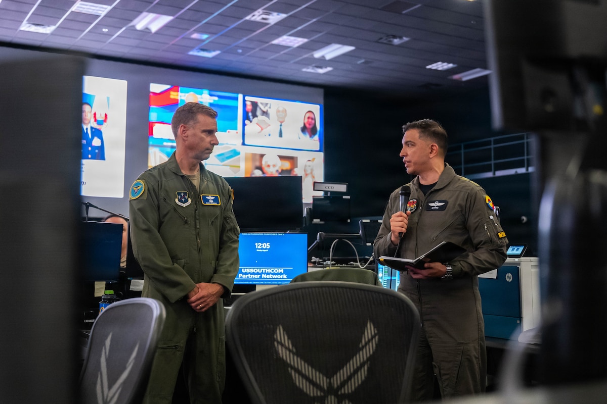 Colombian Aerospace Force Col. Andrés Galvis Espejo, Deputy Combined Force Air Component Commander for PANAMAX 2026, thanks U.S. Air Force Maj. Gen. David Mineau, 12th Air Force (Air Forces Southern) commander, for the opportunity to serve in the role, and addresses multinational participants in the Combined Air Operations Center at Davis-Monthan Air Force Base, Arizona, Aug. 3, 2026.