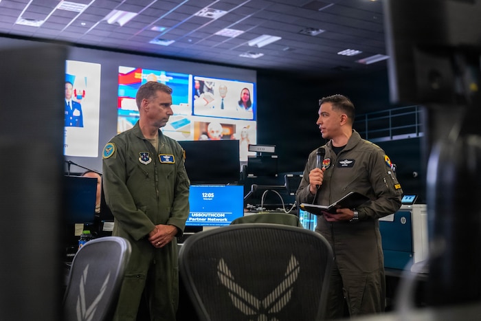 Colombian Aerospace Force Col. Andrés Galvis Espejo, Deputy Combined Force Air Component Commander for PANAMAX 2026, thanks U.S. Air Force Maj. Gen. David Mineau, 12th Air Force (Air Forces Southern) commander, for the opportunity to serve in the role, and addresses multinational participants in the Combined Air Operations Center at Davis-Monthan Air Force Base, Arizona, Aug. 3, 2026.