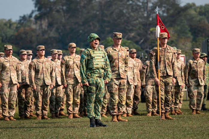 Oklahoma Army National Guard and Royal Brunei Land Force Soldiers stand in formation during the opening ceremony for Exercise Pahlawan Warrior at Tutong Camp near Bandar Seri Begawan, Aug. 11, 2026.
