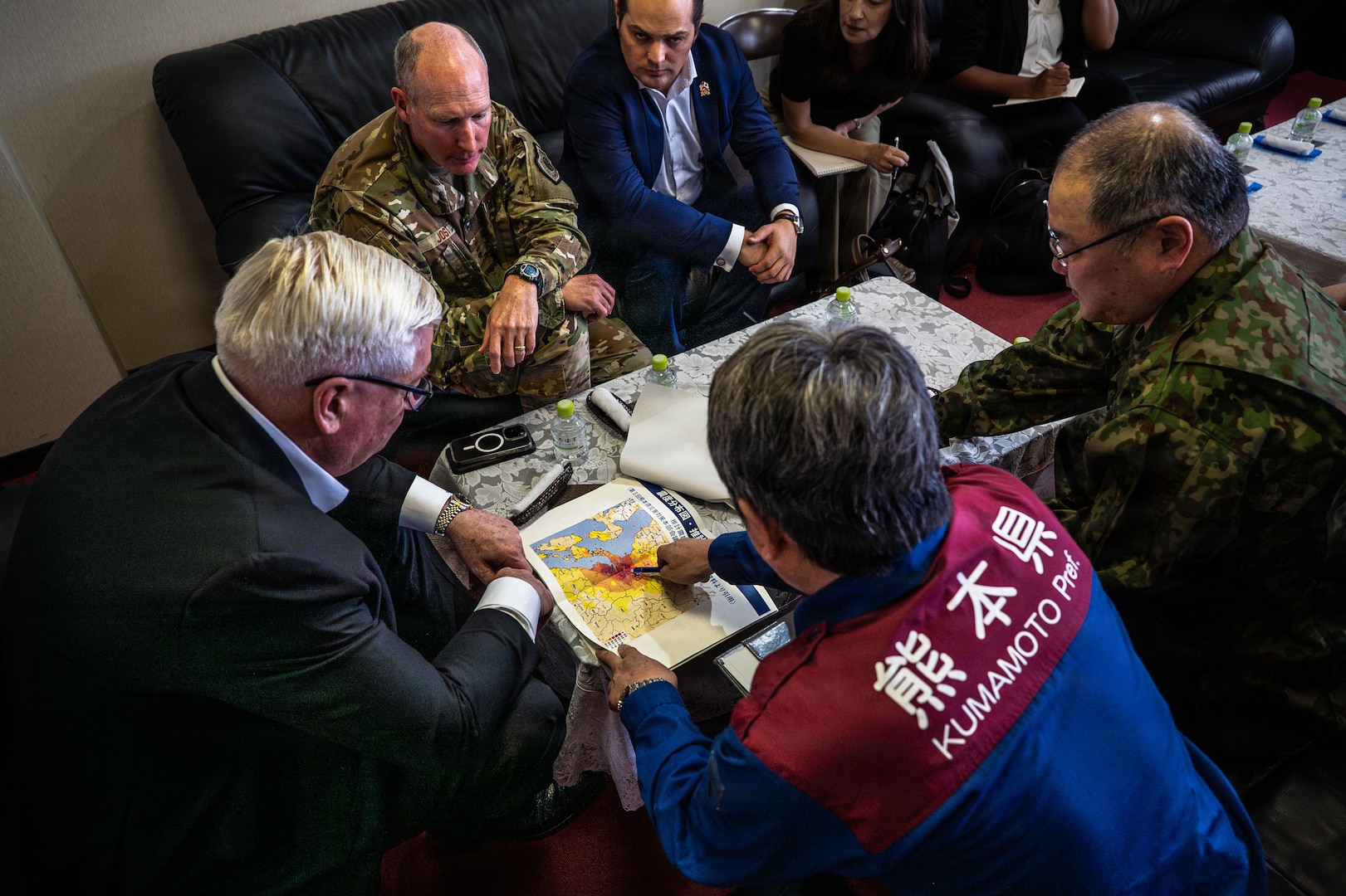 Group of people sitting around a table