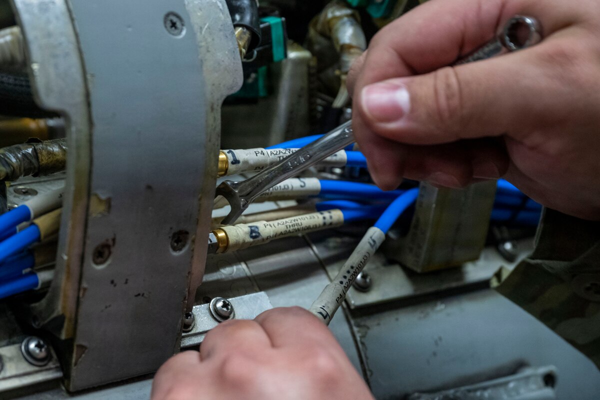 U.S. Air Force Senior Airman Philip Flores Rodriguez, 35th Maintenance Squadron avionics technician, conducts maintenance on AN/ALQ-184(V) II Electronic Countermeasures (ECM) pod components at Misawa Air Base, Japan, Aug. 5, 2026.