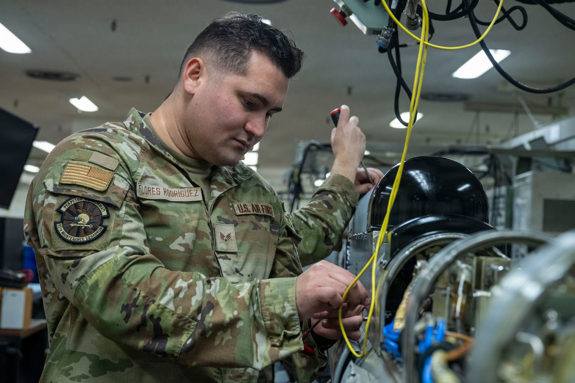 U.S. Air Force Senior Airman Philip Flores Rodriguez, 35th Maintenance Squadron avionics technician, conducts maintenance on an AN/ALQ-184(V) II Electronic Countermeasures (ECM) pod at Misawa Air Base, Japan, Aug. 5, 2026.