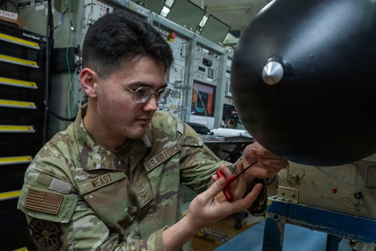 U.S. Air Force Airman 1st Class Trevor Weast, 35th Maintenance Squadron avionics technician, conduct maintenance on an Electronic Countermeasures (ECM) pod at Misawa Air Base, Japan, Aug. 5, 2026.