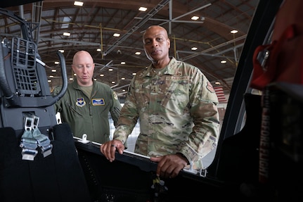 U.S. Air Force Lt. Col. Phillip Bourquin, 99th Flying Training Squadron director of operations, briefs Maj. Gen. Roy Collins, Air Education and Training Command deputy commander, about the training capabilities of the T-7A Red Hawk during his tour of the 12th Training Squadrons T-7A simulators and aircraft at Joint Base San Antonio-Randolph, July 29, 2026. The visit allowed Collins to gain firsthand insight into how the T-7A Red Hawk GBTS will be used to prepare future Air Force pilots. During the tour, he learned how the integrated simulator and aircraft training environment will enhance undergraduate pilot training by providing students with realistic, high-fidelity instruction before they transition to flying the aircraft.