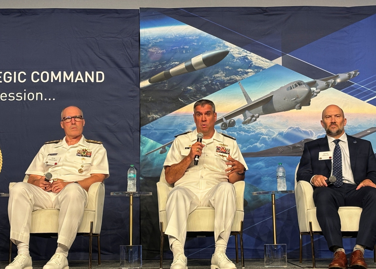 Omaha, Neb. -  Vice Adm. Douglas Williams (center), director of Portfolio Acquisition Executive (PAE) Strategic Systems Programs (SSP), provided insight into supercharging the Navy’s strategic weapons systems (SWS) defense industrial base at the U.S. Strategic Command (STRATCOM) Deterrence Symposium on Aug. 6, 2026, in Omaha, Nebraska. He was joined by Gen. Dale White, direct reporting program manager of Critical Major Weapons Systems; Vice Adm. Robert Gaucher (left), director of submarine programs; Dr. Brad Wallin (right), deputy director of Lawrence Livermore National Lab; and Johnathon Caldwell, vice president of strategic and missiles defense systems at Lockheed Martin.  

U.S. Navy Photo by Shelby Thompson/Released