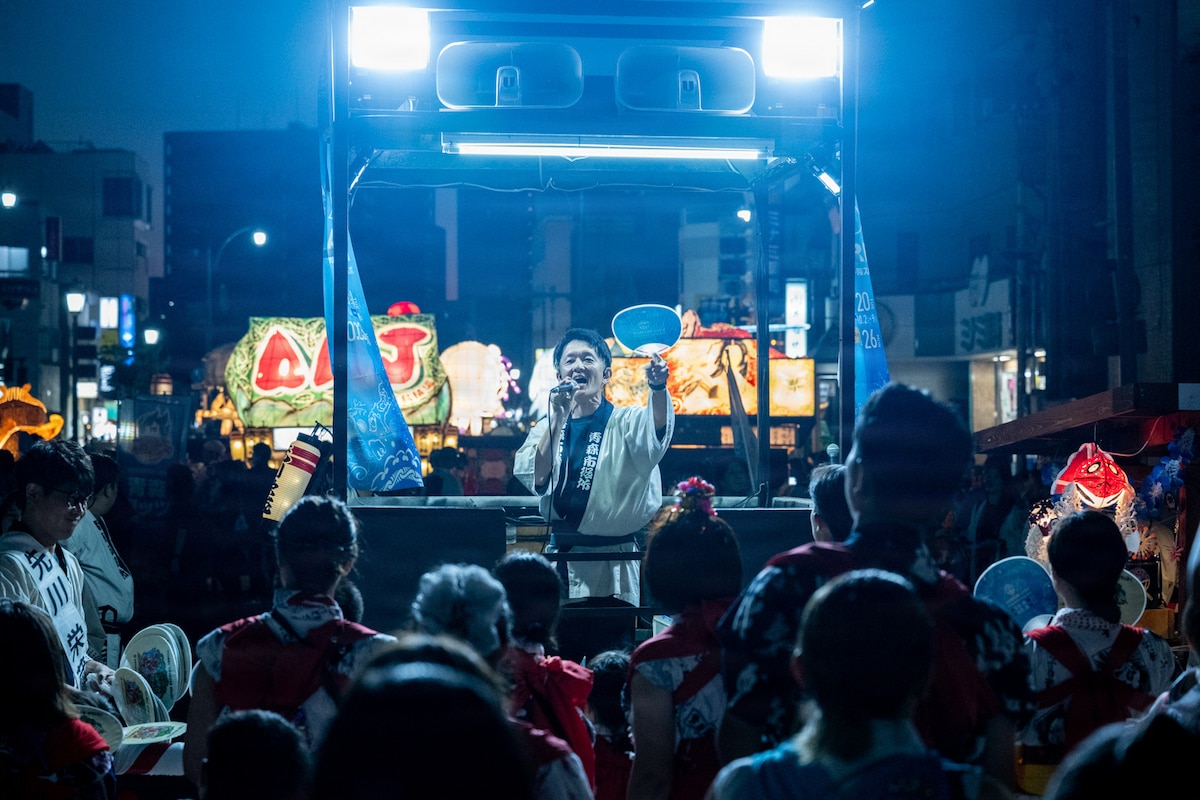A participant chants the phrase “rassera, rassera” during a Nebuta Festival parade in Aomori City, Japan, Aug. 6, 2026. The event brought Misawa Air Base members and local residents together through one of Aomori’s signature cultural traditions, reinforcing the everyday connections that support the U.S.-Japan alliance. (U.S. Air Force photo by Senior Airman Andre Medina)