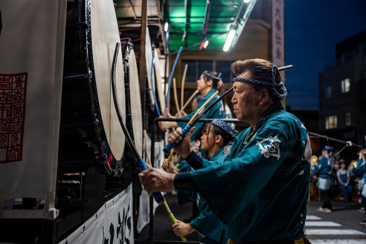 Taiko drummers perform during a Nebuta Festival parade in Aomori City, Japan, Aug. 6, 2026. The performance highlighted one of Aomori’s signature cultural traditions, bringing Misawa AB members and local residents together through shared participation and community engagement. (U.S. Air Force photo by Senior Airman Andre Medina)