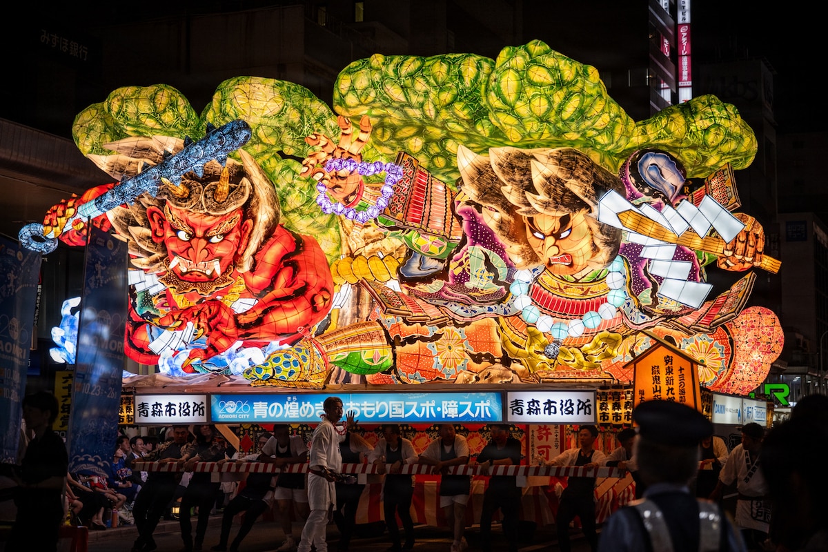 Festival participants push an illuminated parade float during a Nebuta Festival in Aomori City, Japan, Aug. 6, 2026. The event highlighted one of Aomori’s signature cultural traditions, bringing Misawa Air Base members and local residents together through shared cultural participation and community engagement. (U.S. Air Force photo by Senior Airman Andre Medina)