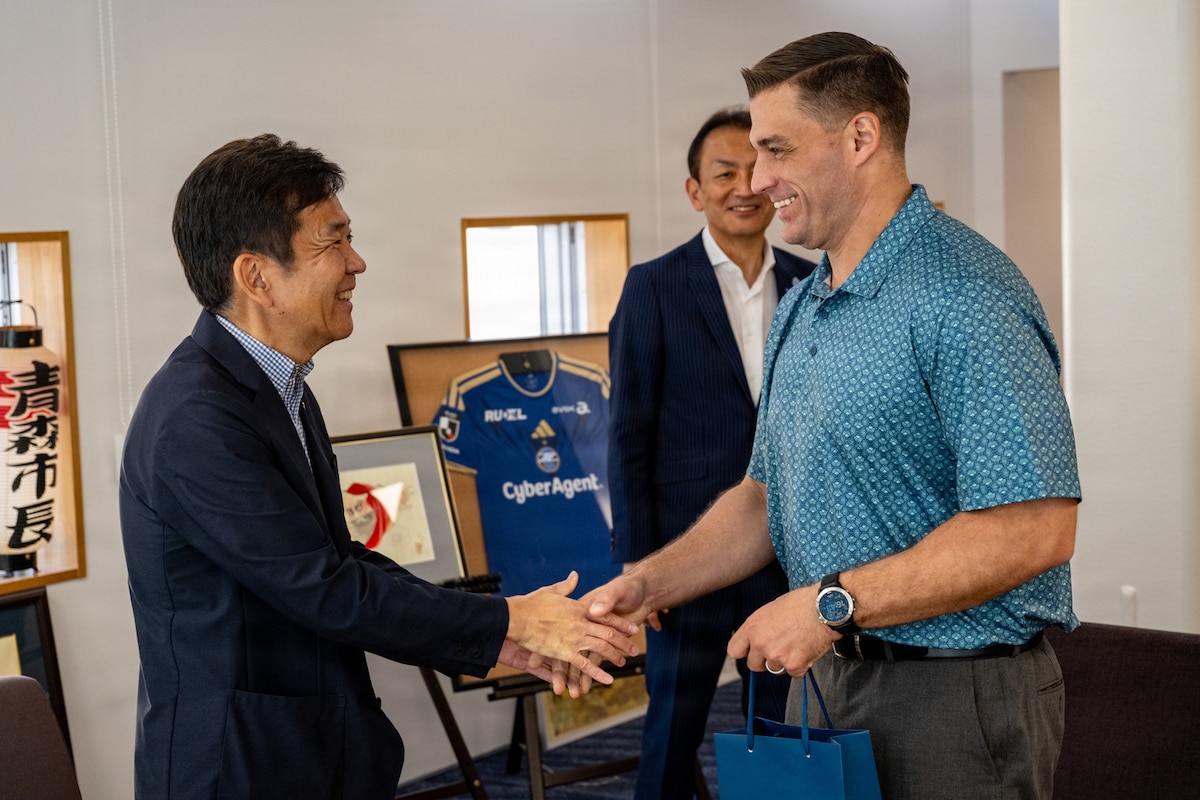 Team Misawa Participates in Aomori Nebuta FestU.S. Air Force Col. Oliver Lause, right, 35th Fighter Wing commander, shakes hands with Hideki Nishi, Aomori City mayor, in Aomori City, Japan, Aug. 6, 2026. The engagement reinforced the partnership between Misawa Air Base and Aomori City, strengthening community relationships that help sustain the U.S.-Japan alliance and shared commitment to regional stability. (U.S. Air Force photo by Senior Airman Andre Medina)ival
