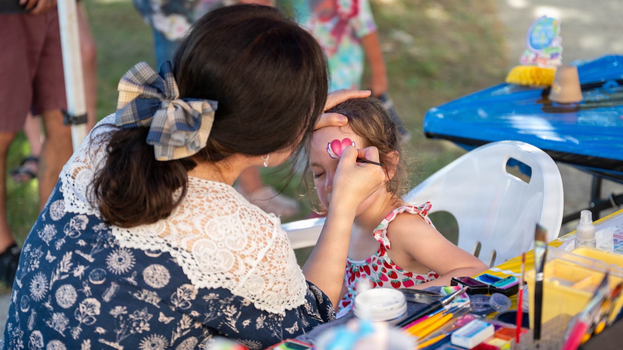 A child receives a face painting during the “Back to School, Ready, Set, Grow” event at Osan Air Base, Republic of Korea, Aug. 11, 2026. The event highlighted the collaborative efforts of the 51st Force Support Squadron and helping agencies to support military children and families as they prepare for a new school year. (U.S. Air Force photo by Senior Airman Megan Cusmano)