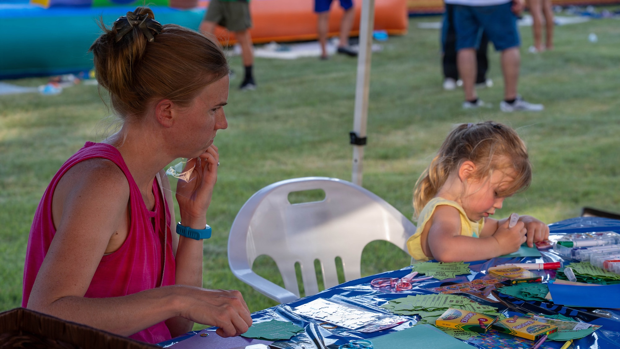 A child participates in an arts and crafts activity during the “Back to School, Ready, Set, Grow” event at Osan Air Base, Republic of Korea, Aug. 11, 2026. Providing family-focused activities and resources helps Osan strengthen its community and support Airmen and their families as the installation transitions to normalized tour lengths. (U.S. Air Force photo by Senior Airman Megan Cusmano)