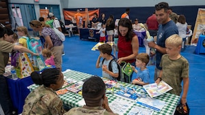 Military families participate in the “Back to School, Ready, Set, Grow” event at Osan Air Base, Republic of Korea, Aug. 11, 2026. The event connected families with helping agencies and community organizations while providing resources to support students and families as they begin a new school year. (U.S. Air Force photo by Senior Airman Megan Cusmano)