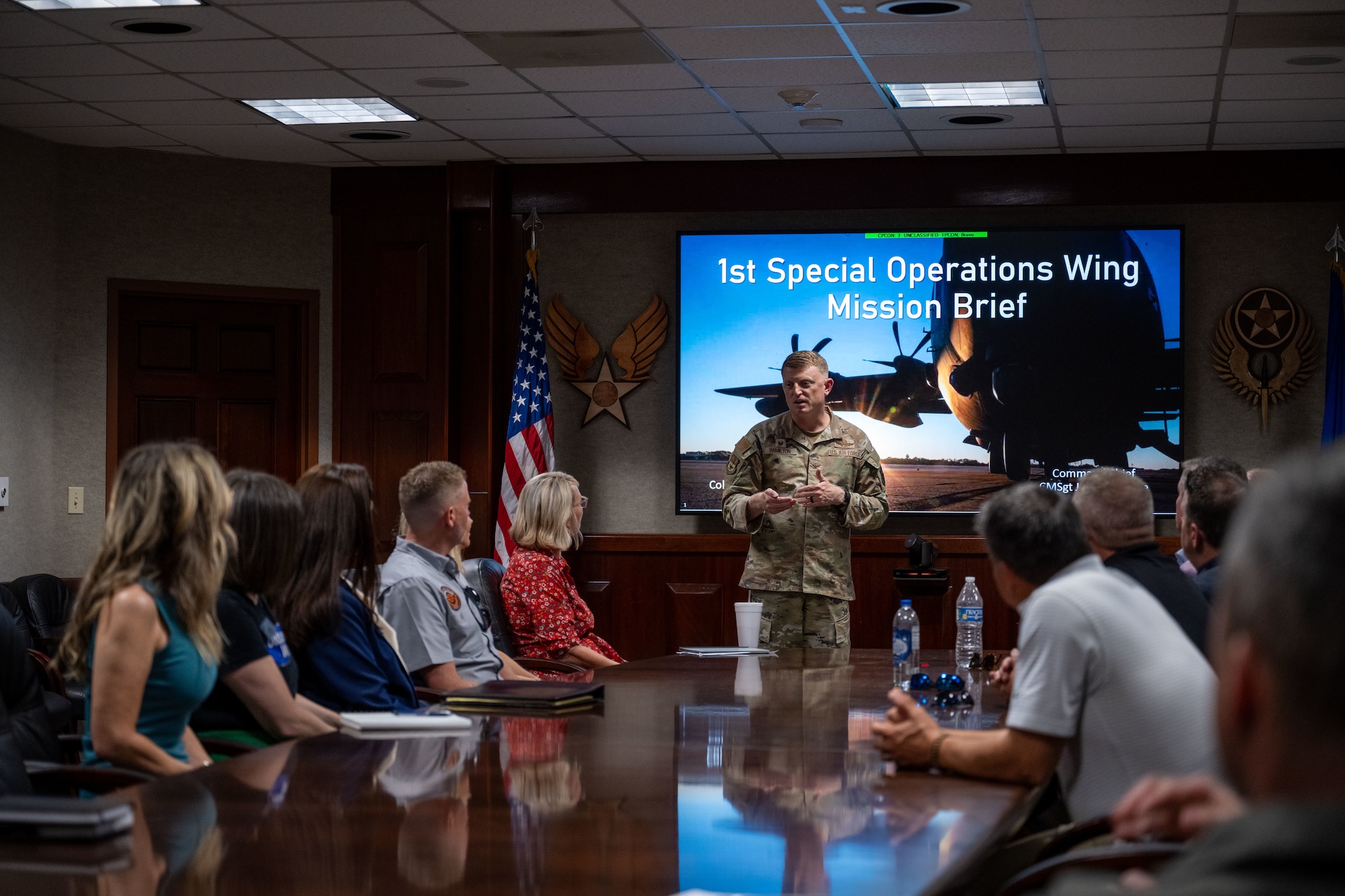 Col. Mark Hamilton briefs honorary commanders during an orientation visit at Hurlburt Field