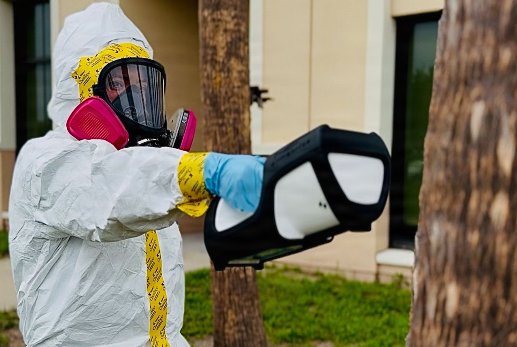 U.S. Air Force Senior Airman Gillian Dacsig, 6th Operational Medical Readiness Squadron Bioenvironmental Engineering technician, locates the radiation source using a Verifinder at MacDill Air Force Base, Florida, July 30, 2026. When Airmen encounter inevitable hazards from aircraft paint and industrial chemicals to excessive noise, heat and radiation, that exposure is documented, becoming part of a permanent record that supports future Department of Veterans Affairs disability claims. (U.S. Air Force photo by Senior Airman Nelvis Sera)