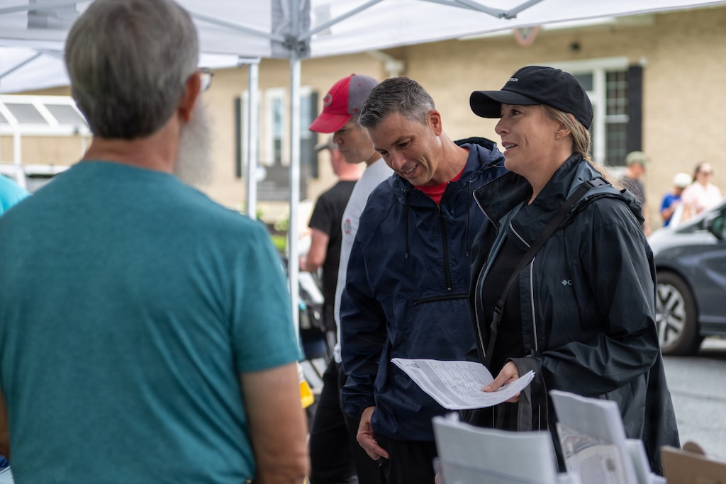 Lt. Col. Durham and his wife, Rebekah, speak with a vendor at a display booth during the Carlisle Barracks Welcome Expo.