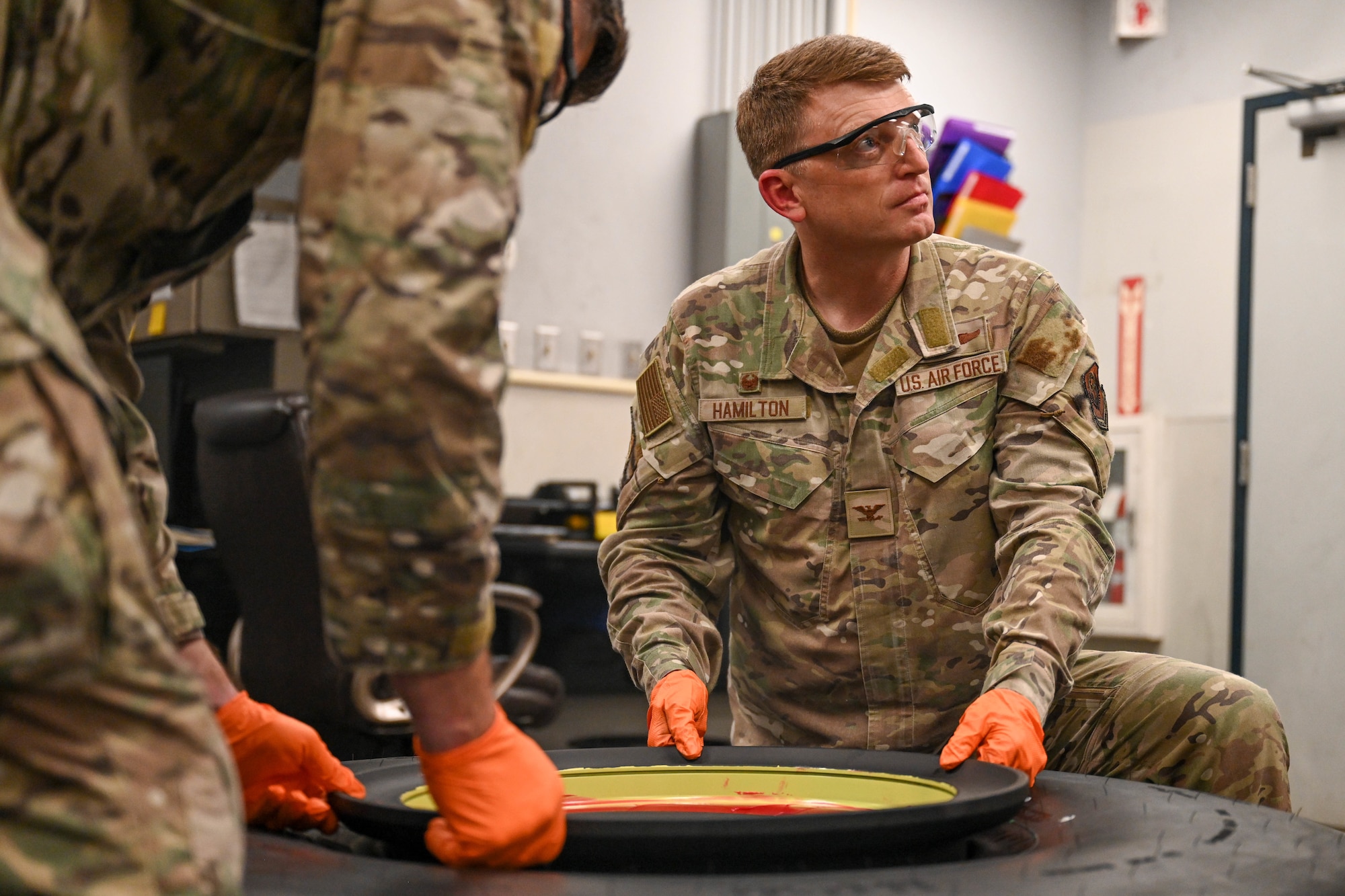 Col. Mark Hamilton, 1st Special Operations Wing commander, assembles an aircraft wheel during a leadership immersion at Hurlburt Field, Florida, July 24, 2026.