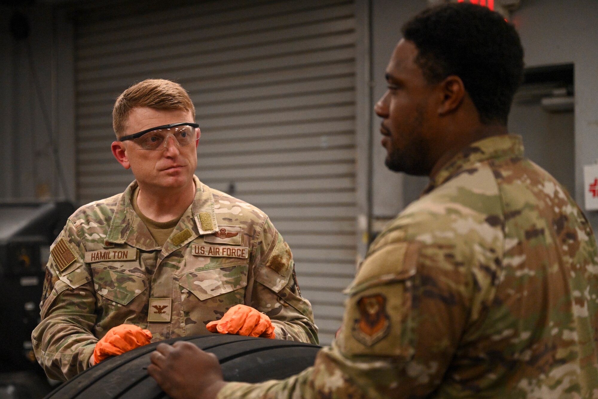 Col. Mark Hamilton, 1st Special Operations Wing commander, speaks to a 1st SOW maintainer during a leadership immersion at Hurlburt Field, Florida, July 24, 2026.