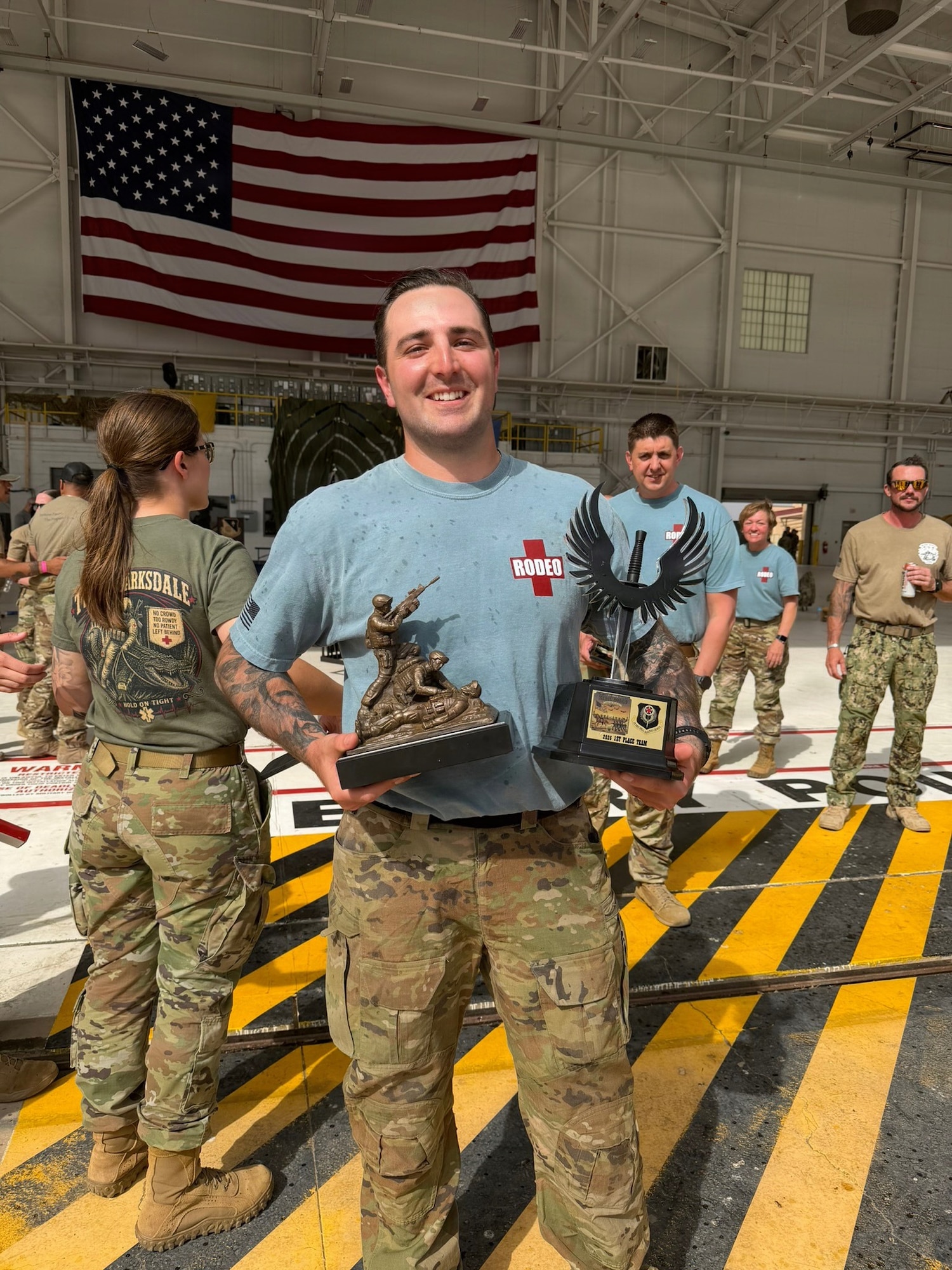 Photo of a person holding a trophy