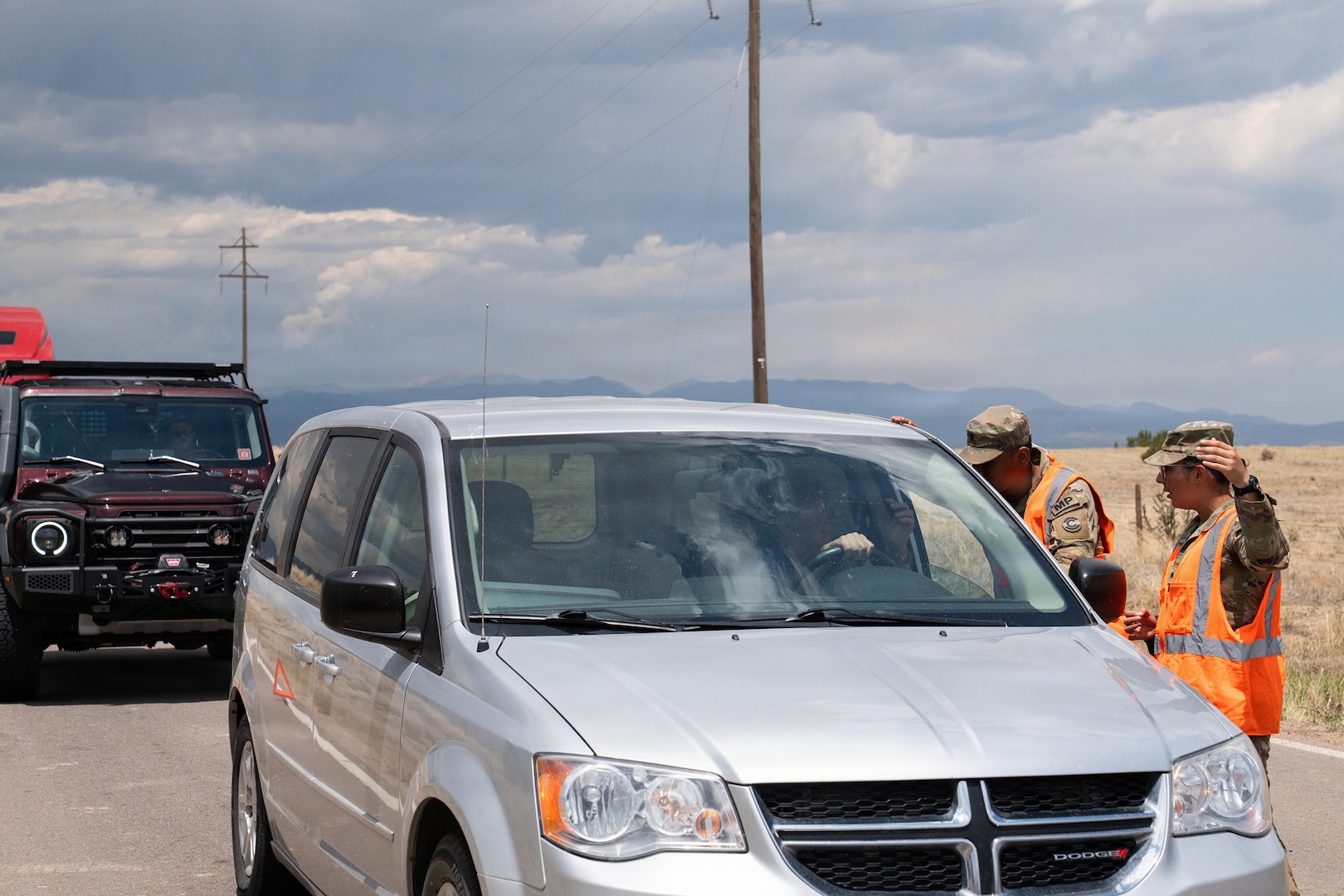 Members of the Colorado Army National Guard’s 220th Military Police Company support the Pueblo County Sheriff’s office, managing traffic control points for road closures and evacuated areas near the Aspen Acres Fire, Pueblo, Colorado, July 9, 2026.