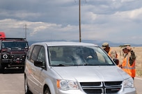 Members of the Colorado Army National Guard’s 220th Military Police Company support the Pueblo County Sheriff’s office, managing traffic control points for road closures and evacuated areas near the Aspen Acres Fire, Pueblo, Colorado, July 9, 2026.