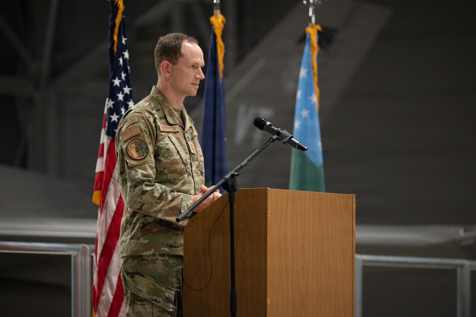 A photo of U.S. Air Force Chief Master Sgt. Daniel Dickerson, the incoming command chief of the 158th Fighter Wing, addressing the crowd as the new 158th Fighter Wing Command Chief during a change of responsibility ceremony at the Vermont Air National Guard Base, South Burlington, Vermont.