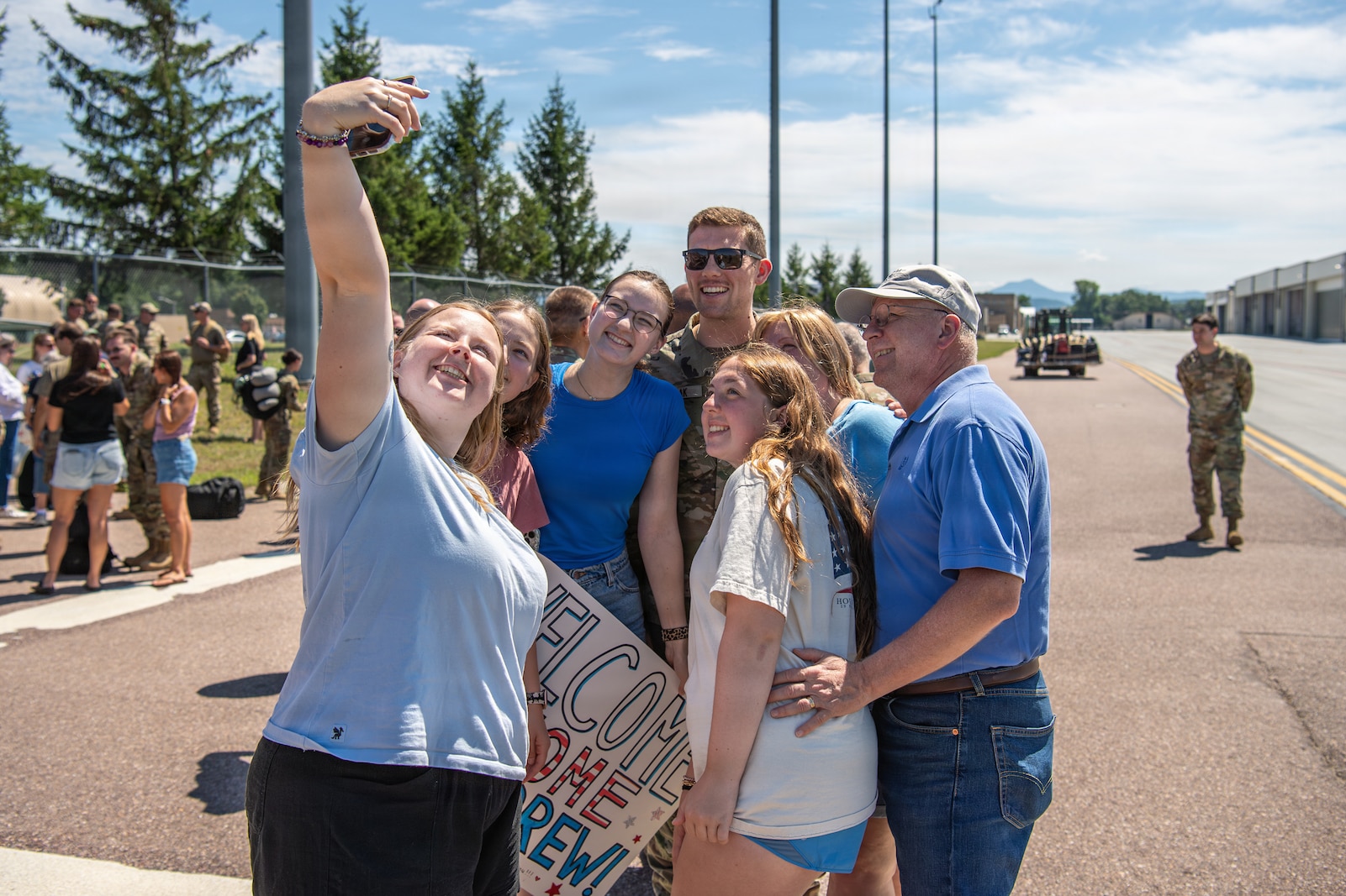 A photo of U.S. Air Force Airmen assigned to the 158th Fighter Wing returning from an overseas deployment, arriving back to the Vermont Air National Guard, South Burlington, VT.
