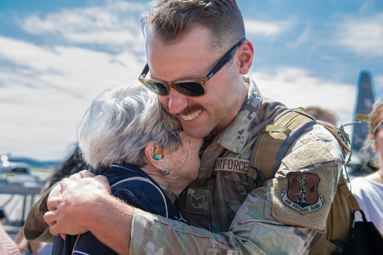 A photo of U.S. Air Force Airmen assigned to the 158th Fighter Wing returning from an overseas deployment, arriving back to the Vermont Air National Guard, South Burlington, VT.