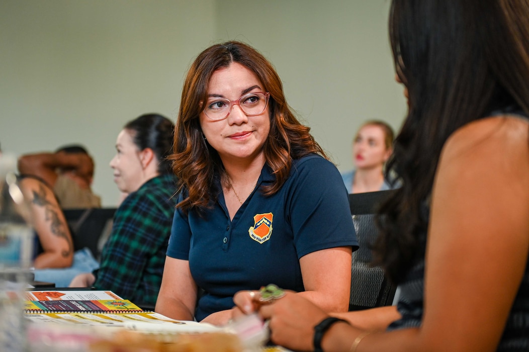 Karol Gaona, 56th Fighter Wing Equal Opportunity specialist, listens to a fellow attendee during an interpersonal resiliency training course at Luke Air Force Base, Arizona, Aug. 6, 2026.