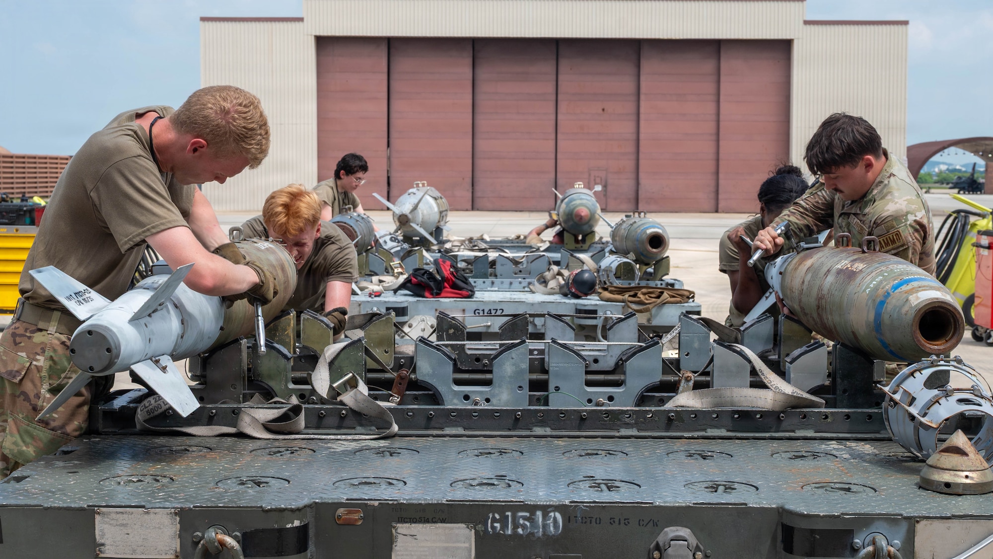 U.S. Airmen assigned to the 51st Munitions Squadron assemble munitions during the 2nd Quarter Ammo Bomb Building and Loading Competition at Osan Air Base, Republic of Korea, Aug. 6, 2026. The competition prepared Airmen to execute Osan’s “Fight Tonight” mission anytime, anywhere. (U.S. Air Force photo by Senior Airman Jessica Mun)