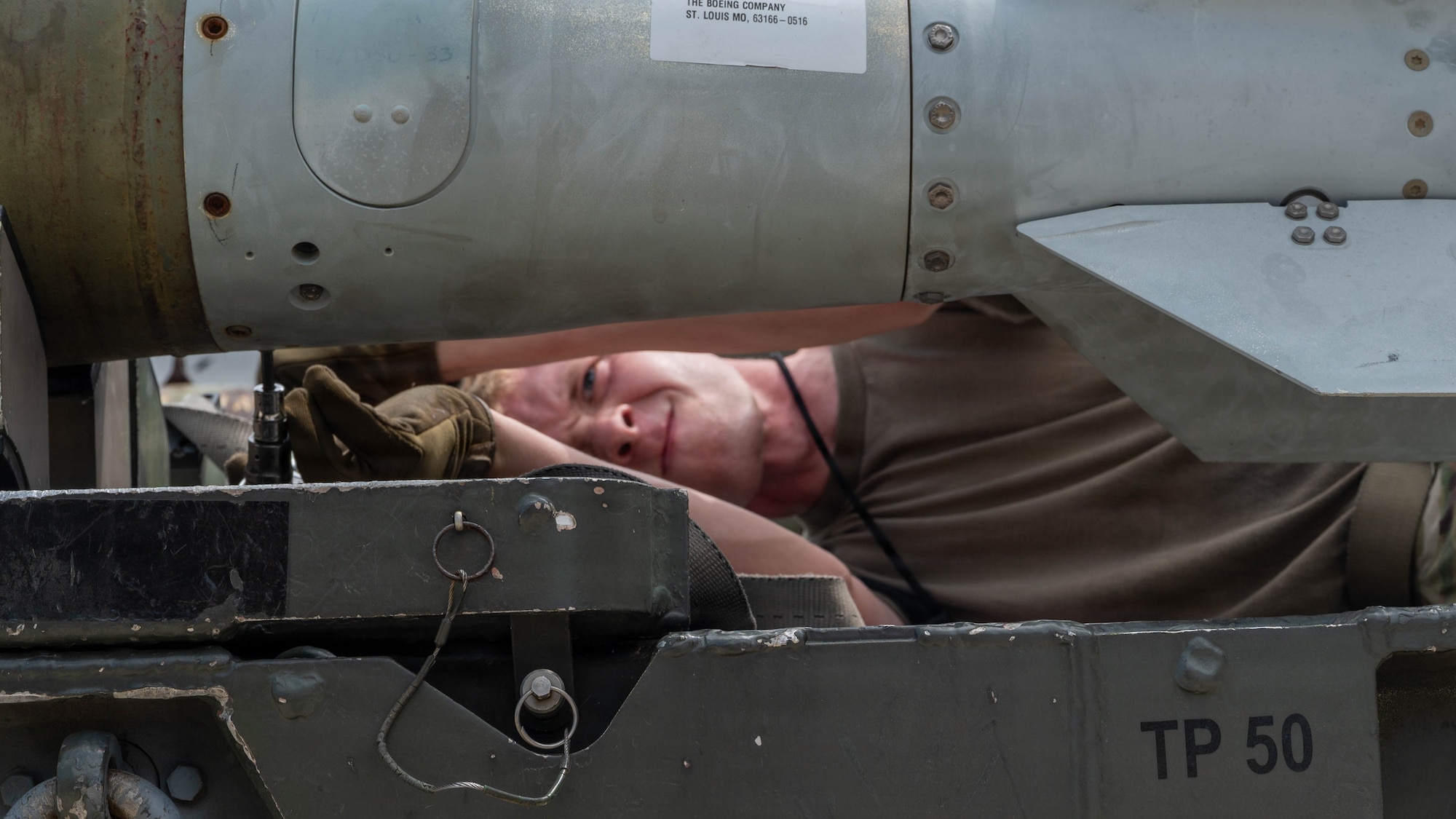 A U.S. Airman assigned to the 51st Munitions Squadron assembles a munition during the 2nd Quarter Ammo Bomb Building and Loading Competition at Osan Air Base, Republic of Korea, Aug. 6, 2026. The competition fostered teamwork, communication, and pride ensuring Airmen are not only technically skilled, but also mentally prepared to perform under real-world pressure. (U.S. Air Force photo by Senior Airman Jessica Mun)