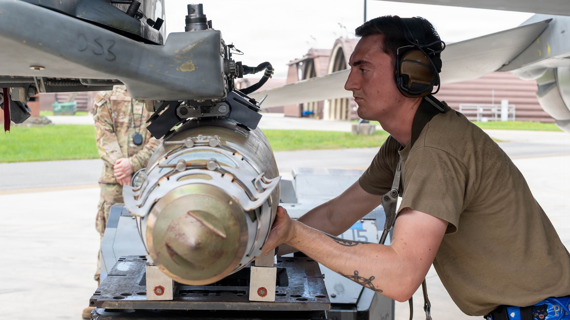 U.S. Air Force Staff Sgt. Thomas Clark, 51st Maintenance Group weapons load crew chief, transports a GBU-38 during the second-quarter Ammo Bomb Building and Loading Competition at Osan Air Base, Republic of Korea, Aug. 6, 2026. The competition allowed weapons crews to sharpen their technical skills and knowledge under pressure, enhancing mission readiness and lethality. (U.S. Air Force photo by Senior Airman Jessica Mun)